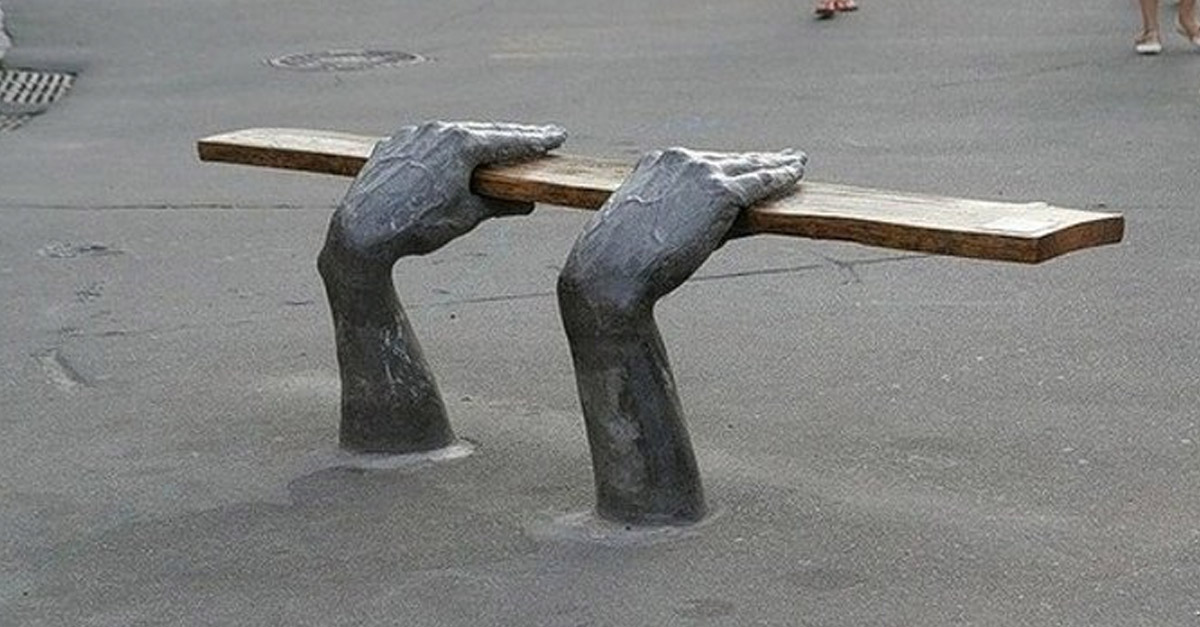 Hands Holding Bench